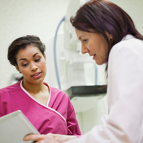 Doctor performing surgery with a team